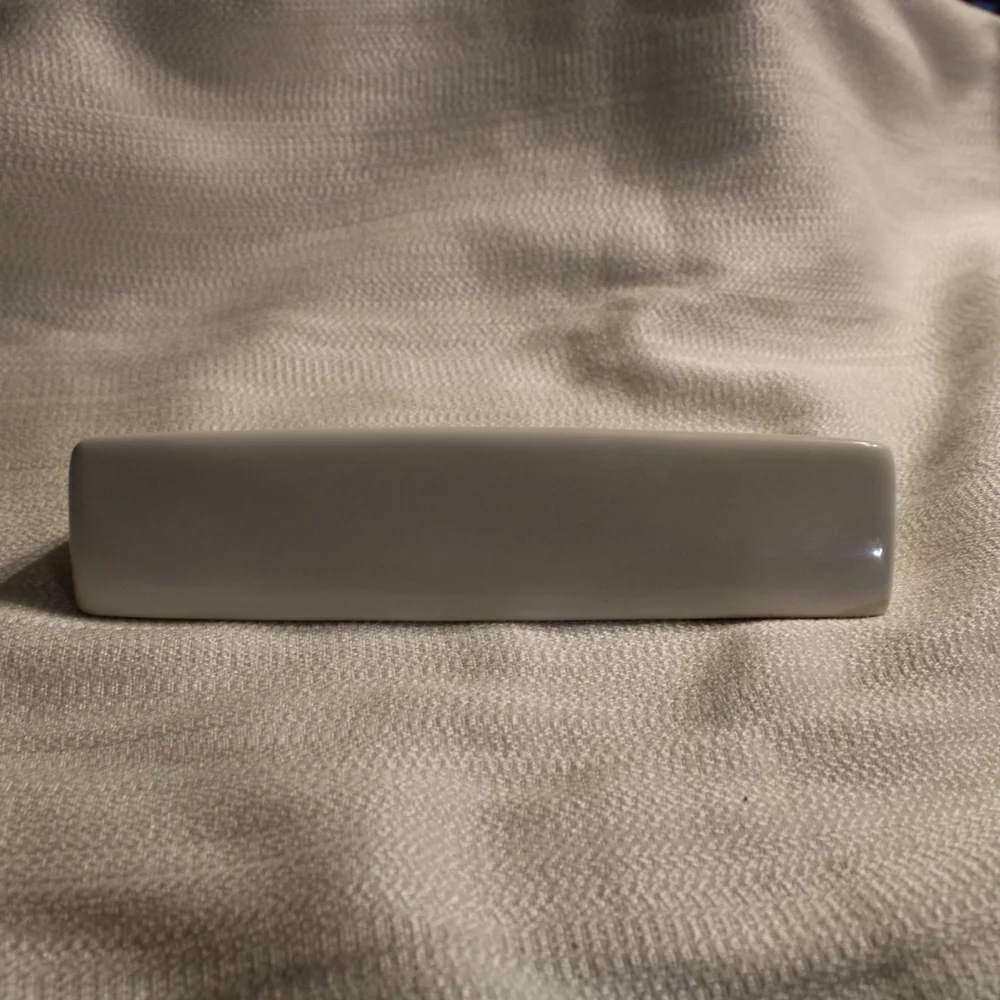 Rae dunn paperweight.